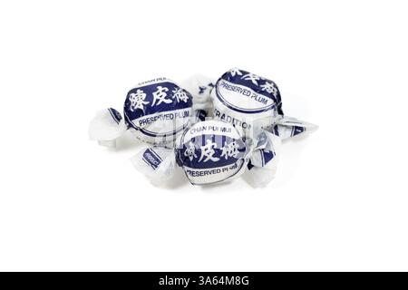 Tang Hoi Kee ����ӛ brand Chan Pui Mui �Ƥ÷ preserved plums candied with orange peel, licorice, and clove. Image isolated on a white background Stock Photo