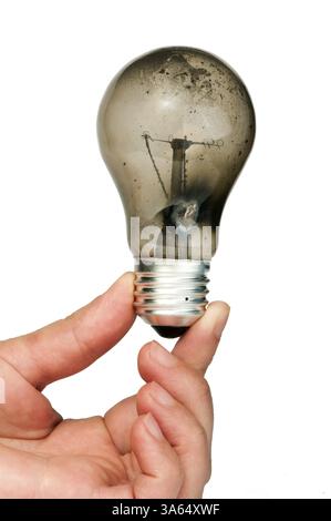 Old light bulb burned inside Stock Photo