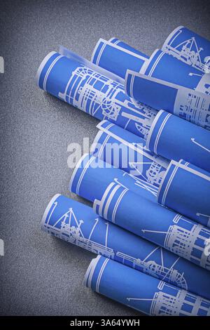 Assortment of blue blueprints on grey background top view construction concept Stock Photo