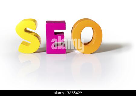 Multicolored text seo made of wood. White background Stock Photo