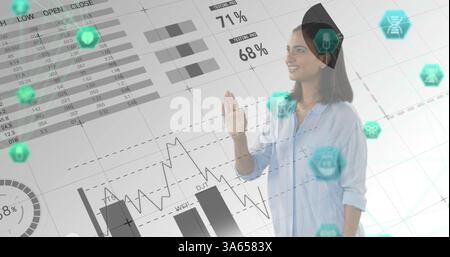 Image of interface with medical icons network of connections over woman using virtual reality screen Stock Photo