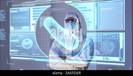 Image of scientist standing behind interactive screen with medical data processing Stock Photo
