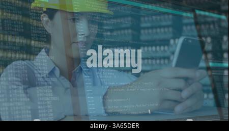 Computer data processing against female caucasian architect using smartphone Stock Photo