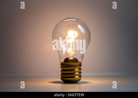 A glowing light bulb representing creativity, innovation, and ideas ...
