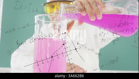 Scientist pouring pink liquid into beaker, analyzing complex mathematical equations Stock Photo