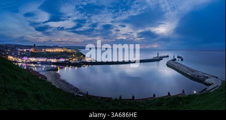 Whitby Harbour at dusk, North Yorkshire, UK. Stock Photo