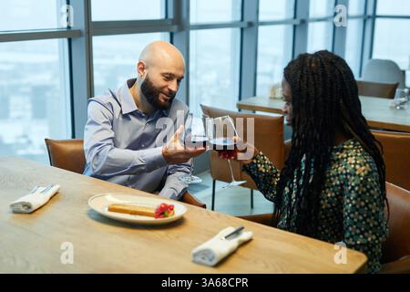 Couple Drinking Wine In Restaurant Stock Photo