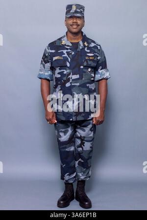 Oct 18, 2004; Norfolk, VA, USA; The Navy introduced a set of concept working uniforms for Sailors E-1 through O-10, in response to the fleet's feedback on current uniforms.  The woodland pattern with predominantly blue color is one of four concept uniforms the Navy plans to wear test this winter.  Each uniform offers a variety of options that Sailors will have the opportunity to choose from.  Feedback from the fleet will be used to determine the final Navy Working Uniform. Stock Photo
