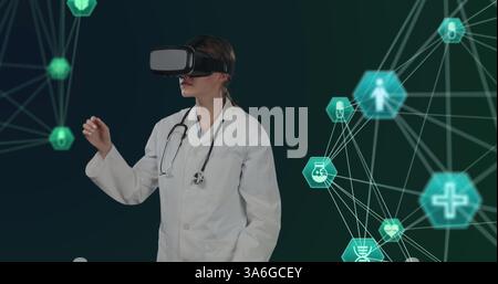 Doctor using VR headset interacting with digital medical interfaces in virtual space. Healthcare, innovation, technology, virtual reality, future, med Stock Photo