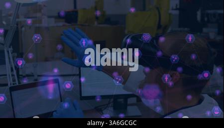 Scientist using VR headset interacting with digital interface in laboratory. Technology, innovation, research, science, futuristic, experimentation Stock Photo