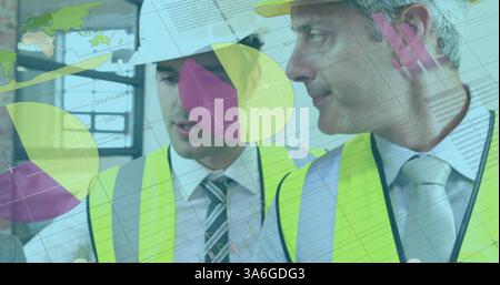 Engineers in safety vests discussing financial charts at construction site. teamwork, collaboration, planning, strategy, architecture, engineering Stock Photo
