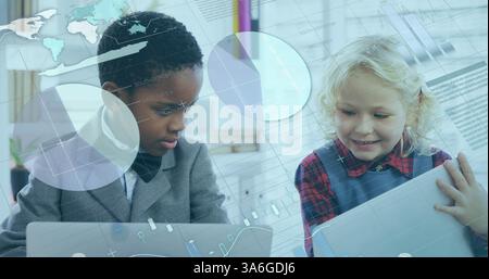 In school, children using laptops and exploring digital interfaces with curiosity. Technology, learning, education, classroom, innovation, students Stock Photo