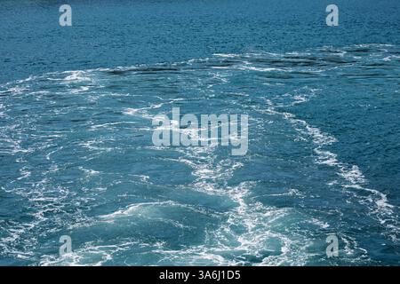 Ocean Water Surface with Waves and Foam Stock Photo