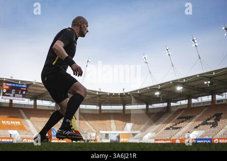 LUBIN, POLAND - APRIL 11, 2021: Football match Polish PKO Ekstraklasa between KGHM Zaglebie Lubin - Podbeskidzie Bielsko-Biala 2:1. In action Tomasz N Stock Photo