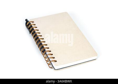 Notebook: A pristine notebook sits at an angle, its blank cover promising countless ideas and sketches, ready to capture thoughts and inspirations on Stock Photo