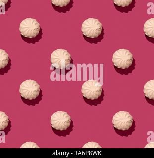 Pink soft marshmallow on pinky background, zephyr on a pink background. Seamless Zephyr Pattern with hard shadow Stock Photo