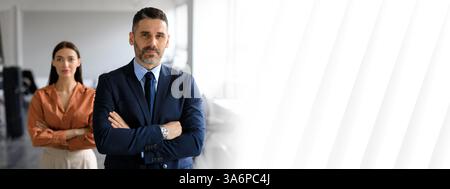 Business team collaborating in a modern office setting during the day Stock Photo