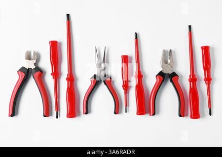 Different electrical tools on light background, flat lay Stock Photo