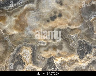 Natural brown grey and beige marble with random abstract texture. Luxurious rare type light brown, white, beige, and grey natural marble stone, Seamle Stock Photo