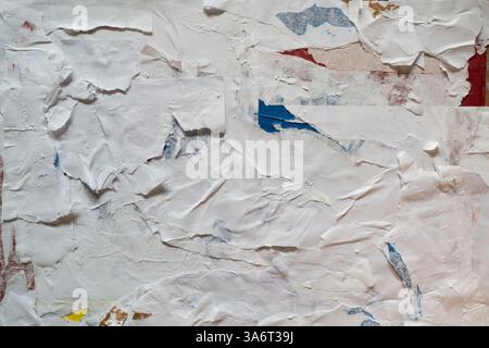 Collage of torn white, red, blue and yellow paper texture Stock Photo