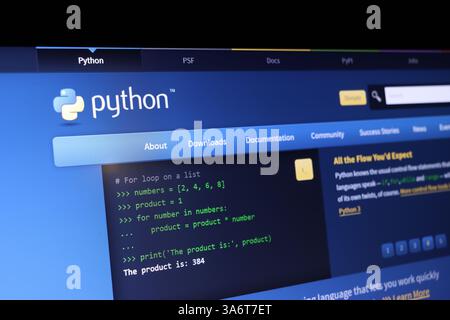 Python programming interface showcasing for loop code and documentation tabs. Stock Photo