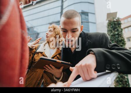 Collaborative outdoor discussion between colleagues focusing on teamwork and planning strategies Stock Photo