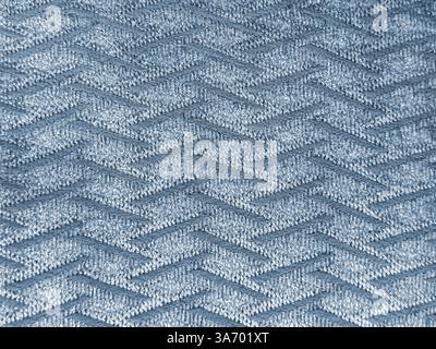 Close up of blue fabric in weaving thread pattern. Blue fabric textile with chevron weaving, Seamless background texture. Stock Photo