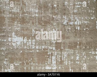 Random abstract carpet rug texture in floral ornamental pattern with golden brown color. Stock Photo
