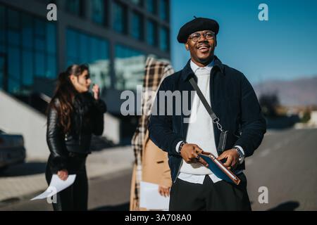 Group of international professionals having a cheerful interaction outdoors Stock Photo