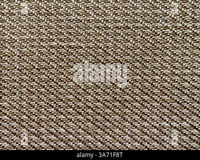 Close up photo of beautiful brown woven rattan texture. Natural golden brown art or rattan weaving art pattern in random repeated shapes. Seamless bac Stock Photo