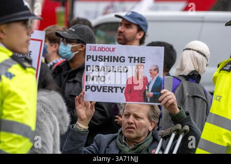 London, UK. 26th Mar, 2025. Protest against welfare cuts outside Downing Street London UK Credit: Ian Davidson/Alamy Live News Stock Photo