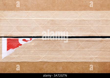 Close-up of cardboard box with tape Stock Photo