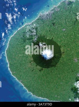 Nov 14, 2014 - Egmont, New Zealand - Egmont Park from space. A new book released this week highlights how the view from space with Earth-orbiting sensors is being used to protect some of the world's most interesting, changing, and threatened places. From space, Egmont National Park in New Zealand shows the benefits and limitations of protected areas. In this Landsat 8 image acquired on July 3, 2014, the park, with Mt. Taranaki at its center, was established in 1900. This isolated island of protected forest (dark green areas) is surrounded by once-forested pasturelands (light and brown green).' Stock Photo