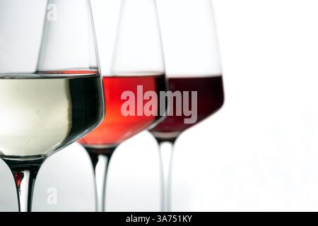 three wine glasses with wine on white  background Stock Photo