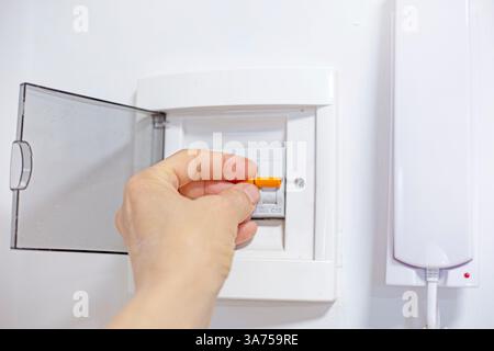 switching the panels in the network voltage in the house Stock Photo