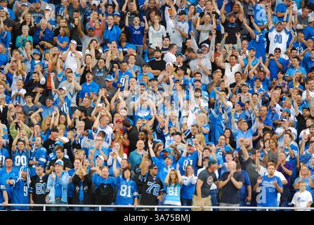 DETROIT, MI - SEPTEMBER 14: Fans hold up cards while defense has third down play during the game