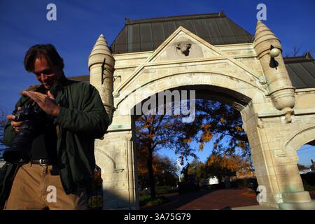 Oct. 10, 2012 - Chicago, IL, USA - Photographer Lloyd DeGrane checks his works as he makes pictures of Burnham and Root's Union Stock Yard Gate on Exchange Avenue at Peoria Street, October 10, 2012, at the request of Illinois Department of Corrections inmate Larry Kurina. (Credit Image: © Michael Tercha/MCT/ZUMAPRESS.com) Stock Photo
