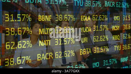 Stock market data processing against diverse male and female supervisors checking stock at warehouse Stock Photo