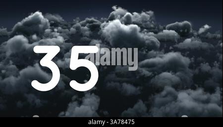 Dark storm clouds forming in sky with large white number 35 overlay Stock Photo