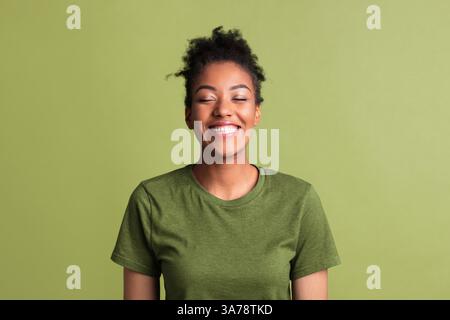 Close up portrait of laughing afro woman Stock Photo