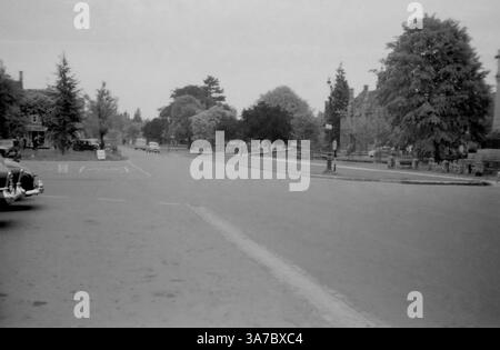 A quiet crossroads in Bourton-on-the-Water, Gloucestershire, captured on black and white film during the 1960s. Stock Photo