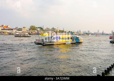 Bangkok, THAILAND - February 20, 2025: View Chao Phraya Express Boat or River Transportation From Wang Lang Pier on Chao Phraya River this is very fam Stock Photo