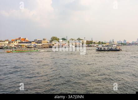 Bangkok, THAILAND - February 20, 2025: View Chao Phraya Express Boat or River Transportation From Wang Lang Pier on Chao Phraya River this is very fam Stock Photo