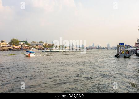 Bangkok, THAILAND - February 20, 2025: View Chao Phraya Express Boat or River Transportation From Wang Lang Pier on Chao Phraya River this is very fam Stock Photo