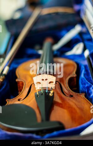 Violin in a blue violin case. Stock Photo