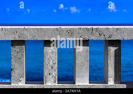 Sea balcony in white travertine along the italian riviera stroll. Stock Photo