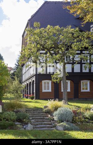 Half-timbered house with garden in Obercunnersdorf, Oberlausitzer Bergland, Saxony, Germany, Europe Stock Photo
