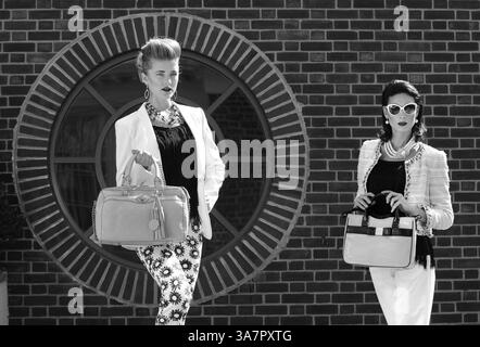 Feb. 27, 2013 - Annapolis, MD, USA - On Bethany (left): Marc Cain print pants, $318; Athena earrings, $78; both Jones & Jones. Rag & Bone blazer, Ruth Shaw, $795. Avec fringe top, Lori K, $110. Isabelle Fiore bag, urbanminx.com, $350. Rococo Rocks necklace, Bijoux Inspired Jewels, $460. On Anna: Theory pants, $220, and fringe top, $325; Alice + Olivia tweed jacket, $495; all L'Apparenza. Kate Spade purse, $318; Prada glasses, $475; both Handbags in the City. Pearl earrings, Jones & Jones, $98. Rococo Rocks necklace, Bijoux Inspired Jewels, $590. (Credit Image: © Lloyd Fox/MCT/ZUMAPRESS.com) Stock Photo