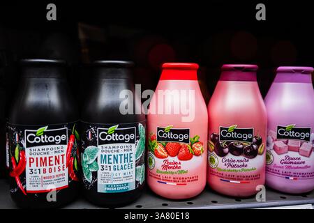 Lviv, Ukraine - March 25, 2025: Colorful Cottage brand shower gels in various fragrances arranged neatly on display. Stock Photo