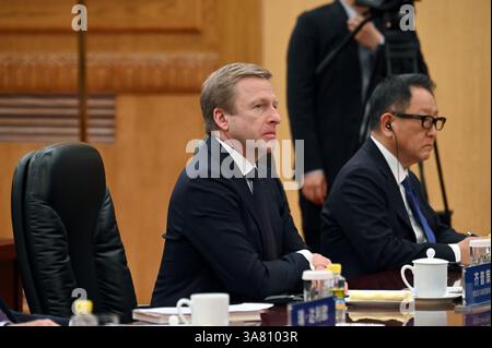Peking, China. 28th Mar, 2025. Oliver Zipse, CEO of BMW, sits in the Great Hall of the People. China's head of state and party leader Xi promoted China as a safe investment location in front of international CEOs. Credit: Johannes Neudecker/dpa/Alamy Live News Stock Photo